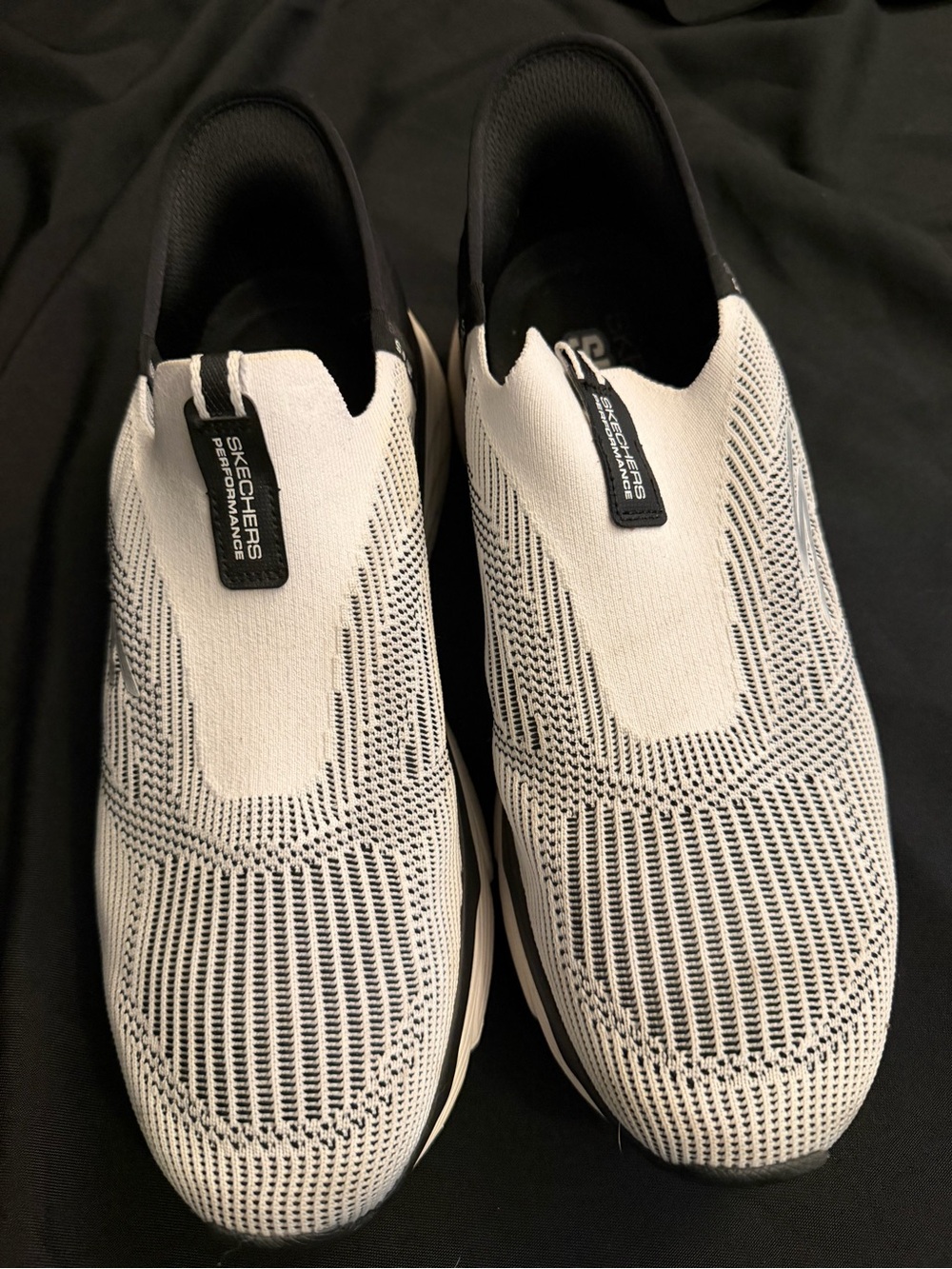 Skechers Men's Slip-On Knit Sneakers in White and Black